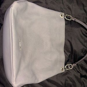 Very taken care of Michael Kors purse